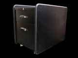 an image of a metal filing cabinet with three drawers