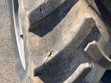 a large tire on the side of the road