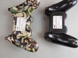 two remote controls that are sitting on a table