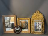 three mirrors and a mirror on a shelf