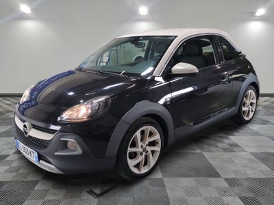 a picture of a black and white car parked in a garage