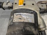 a close up of a drill on a table