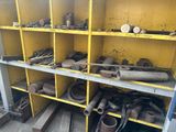 a yellow shelving filled with lots of different tools
