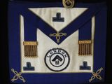 an image of a masonic apron with a cross on it