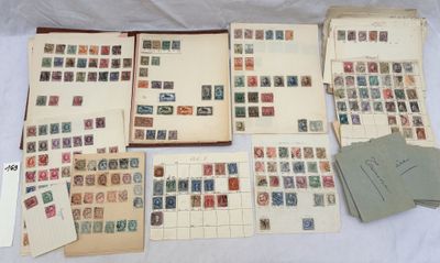 several different types of stamps are laid out on a sheet of paper