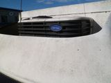 an image of a ford logo on the front of a truck