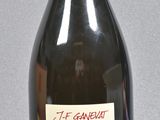 a bottle of wine that is sitting on a table