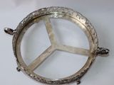 a silver tray with a peace sign on it