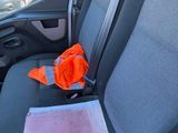 a seat in the back of a car with a bag on it