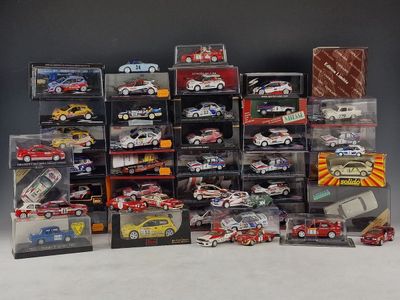 a lot of toy cars that are in a display case