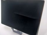 an image of a black computer monitor on a stand
