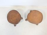 two wooden bowls that are sitting on the floor