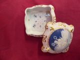 a small box with a picture of a woman on it