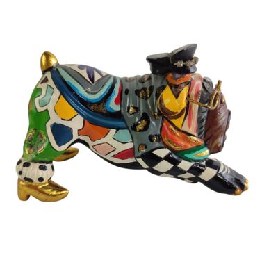 statue of a dachshund dog with a hat and a top hat