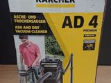 la boîte d'un aspirateur est posée sur une table