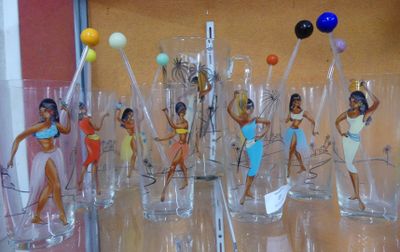 a lot of glasses that have different designs on them