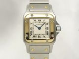 an image of a silver and gold wrist watch with roman numerals