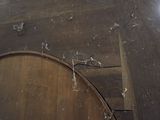 a close up of a wooden barrel with a hole in it