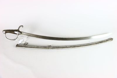 pair of silver plated swords on a white surface with a white background