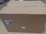 a cardboard box that is sitting on the ground