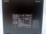 the back side of a laptop with a battery on it