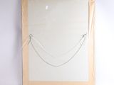 a picture of a mirror hanging on the wall