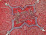 red and blue paisley design on a red and blue background