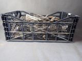 a basket full of silverware on a table