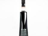 an image of a bottle of black vinegar on a white background