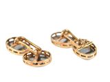 two pairs of gold earrings on a white background
