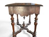 a small table with a mirror on top of it