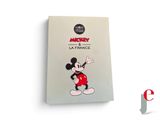 a book with a mickey mouse character on the cover