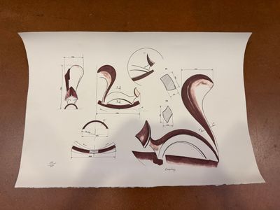 a piece of paper with drawings on it on a table