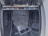 an open oven with the door open and the inside of it
