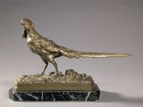 statue of a pheasant on a marble base on a white background