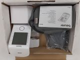 a box with a cell phone and other items in it