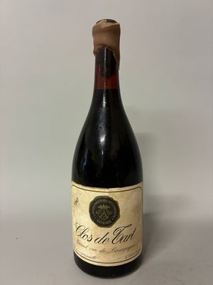 a bottle of wine that is sitting on a table
