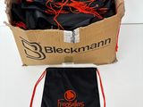a black bag with orange string and a black bag with red string