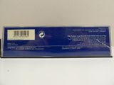 the back of a blue box with a barcode on it