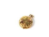 an image of a gold locke with flowers on it on a white surface