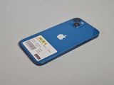 a blue apple iphone with a price tag on it