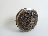 an image of a silver ring with a design on it