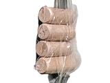 a person holding a pair of scissors wrapped in plastic