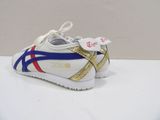 white and blue sneakers with red and blue stripes on the sole