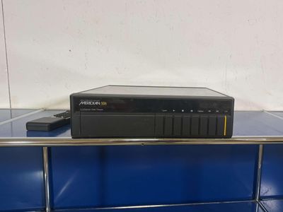 an image of a rack with a dvd player on it