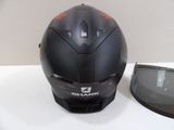 a helmet and goggles sitting on a table