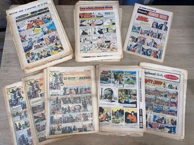 beaucoup de vieilles bandes dessinées posées sur une table