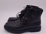 a pair of black leather boots on a white background