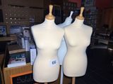 two mannequins that are on display in a store