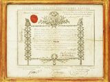 an old document with a red seal on it in a gold frame